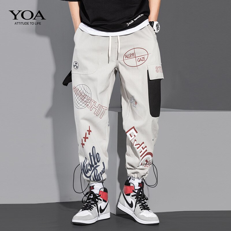 Graffiti Cargo spodnie męskie w pasie spodnie do joggingu mężczyźni list Casual spodnie ze sznurkiem męskie spodnie do biegania Streetwear
