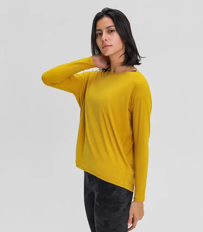 Løst yogatøj til kvinder til forår og efterår, nøgen og hudvenlig tynd fitnesssports-pendler-t-shirt med lange ærmer