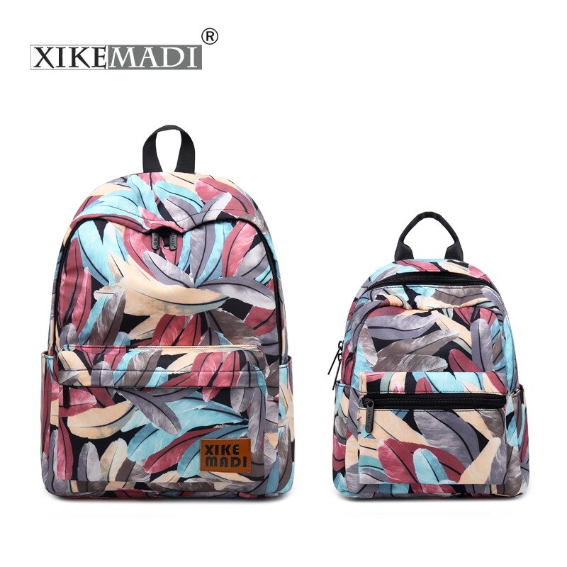 Xikemadi marca feminina mochila design pena impressão juventude anti-roubo viagem packbag meninas estudante sacos de escola feminino bagpack
