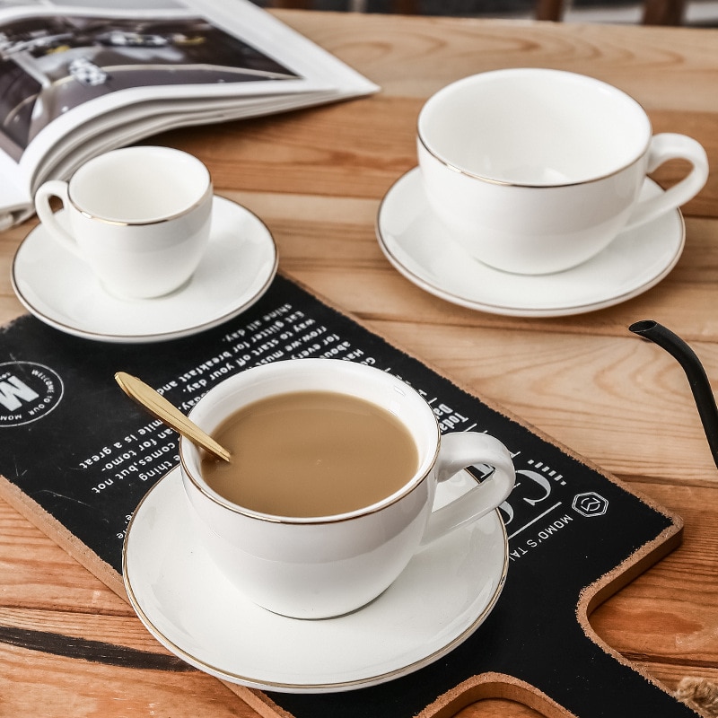 Sjov glødende europæisk hvid luksus porcelæn kop og underkop keramik simpel te sæt moderne kaffekopper tazas para cafe køkken