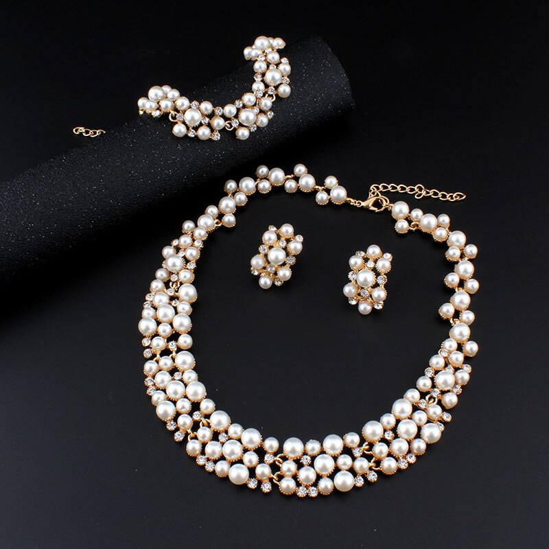 jiayijiaduo Wedding dress jewelry set Imitation pearl Necklace earrings Bracelet set For women Gold color party Christmas