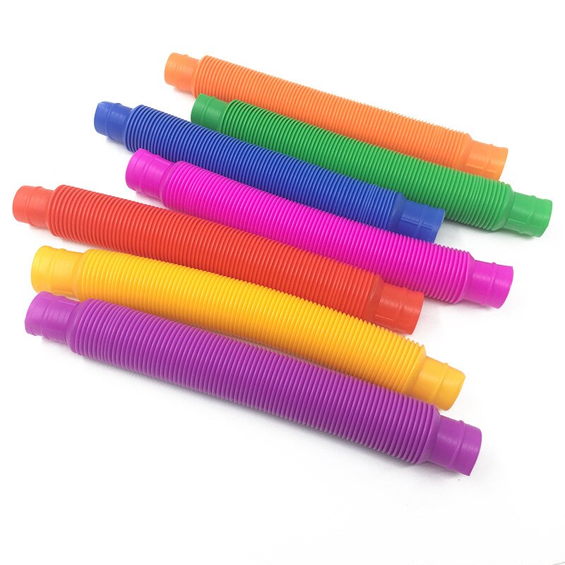 5 pezzi di plastica colorata Pop Tube Coil creativo magico giocattolo cerchio giocattoli divertenti sviluppo precoce educativo giocattolo pieghevole