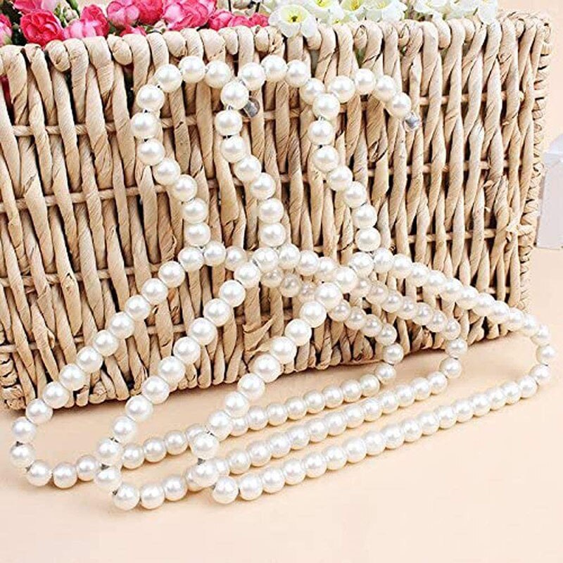 Pack de 3 perchas elegantes de plástico con perlas blancas a la para niños y mascotas.