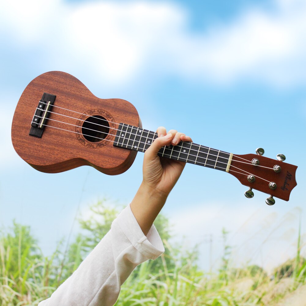 Ukelele Soprano de 21 pulgadas de Muslady, conjunto de instrumentos musicales de guitarra de madera de caoba de Ukelele, sintonizador, cuerda, Correa y bolsa