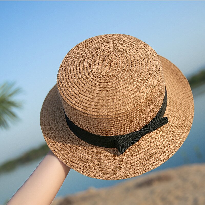 Rep platt hatt halm solskydd kvinnlig halm rosett utomhus sol strand hatt sommar hattar kvinnor keps panama kepsar