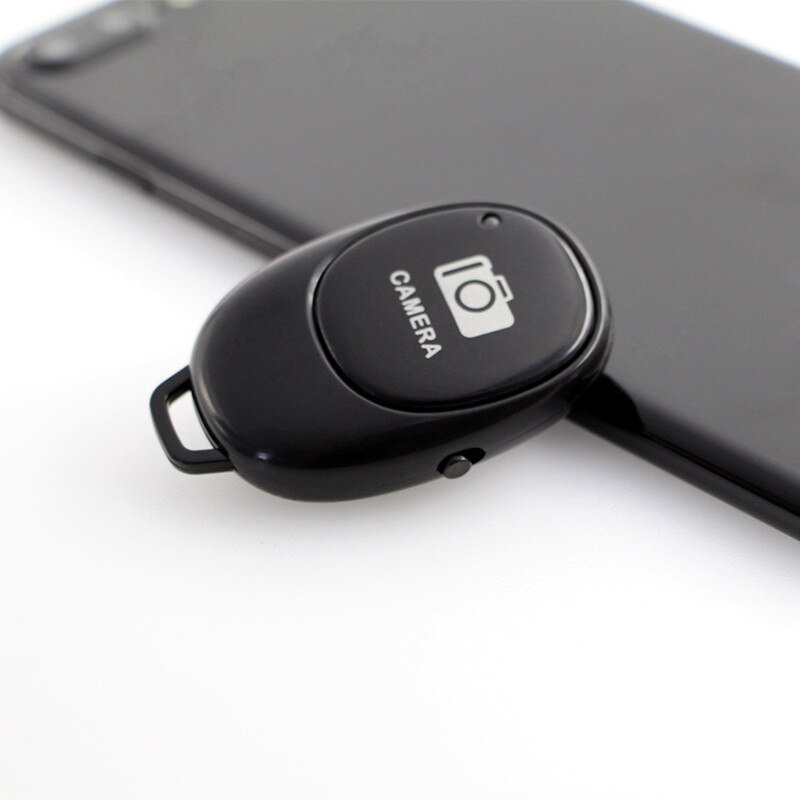 Mini pulsante telecomando Bluetooth Controller Wireless autoscatto fotocamera Stick rilascio otturatore telefono Selfie per ios / Android