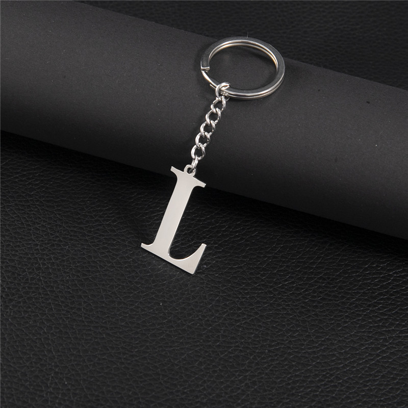 Punk diy az bokstäver nyckelring kvinnor metall initial hänge nyckelring ring för män trend 26 alfabet nyckelring väska tillbehör: Elfenben