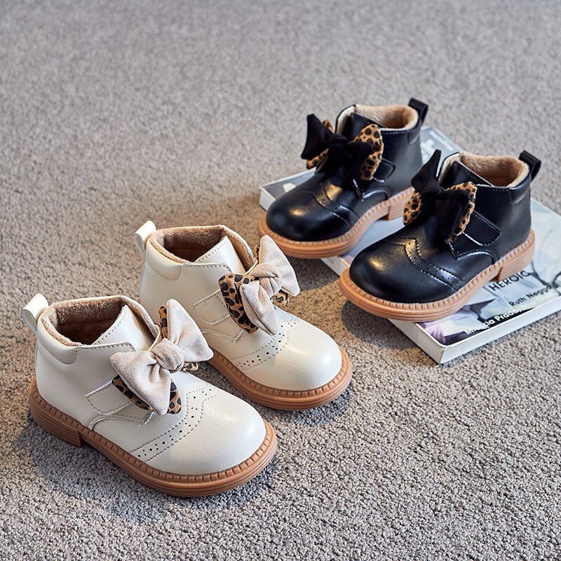 Stivali da bambina Martin primavera Solid Hollow carino con fiocco Leopard PU stivali da scuola principessa novità stivaletti Hook &amp; Loop scarpe da principessa