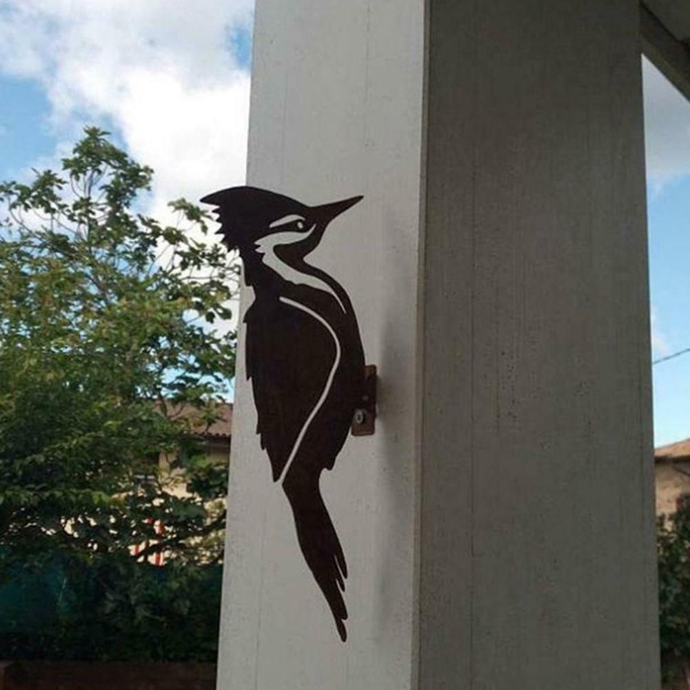 Havepæl stablet fugl rusten jernhåndværk fugleformet kunst silhuet skulptur udendørs havehegn dekoration