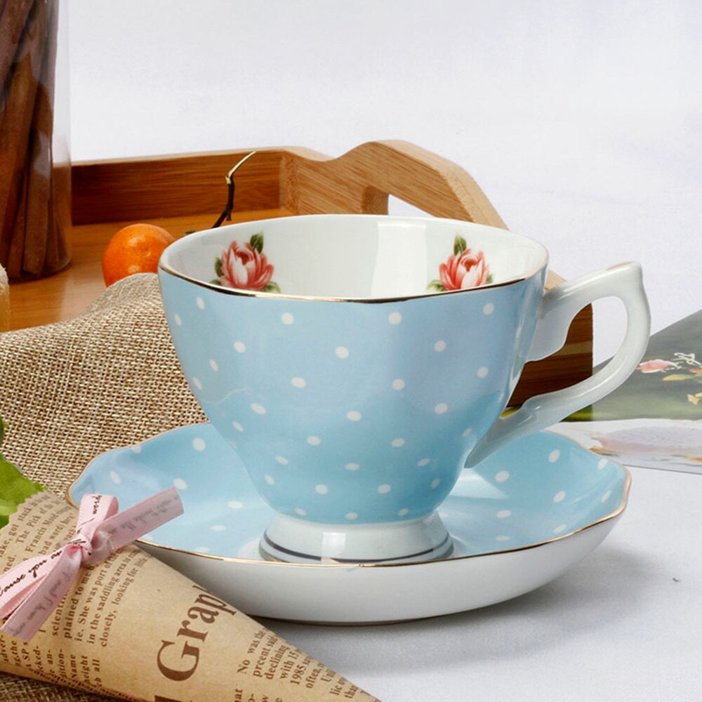 Estilo británico Rosa China de hueso taza de café y platillo de té de la tarde estilo Pastoral flor taza de té