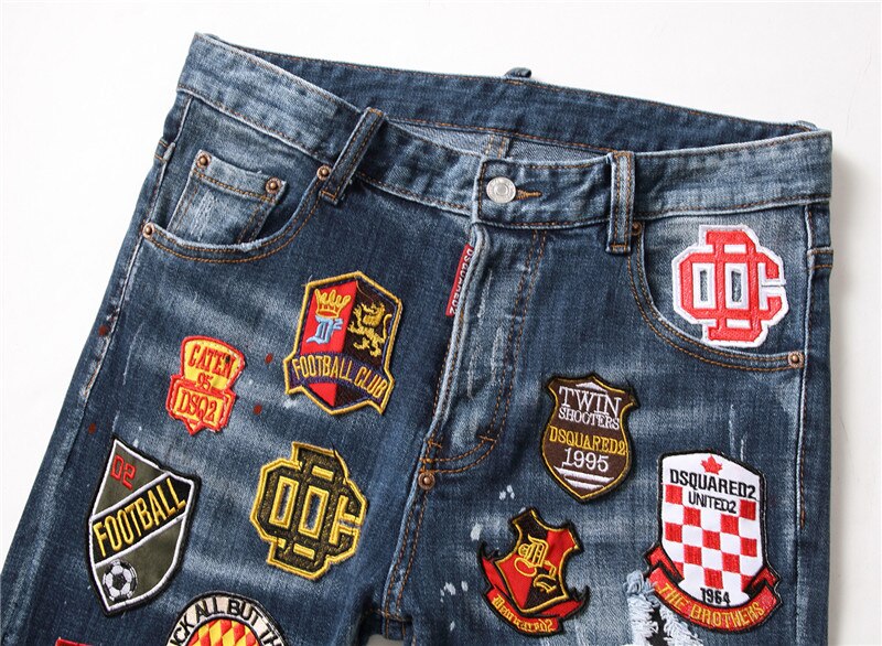 Bekende merken heren slim jeans gescheurde jeans voor mannen kleine stretch verf badge broek herenkleding hiphop streetwear blauw