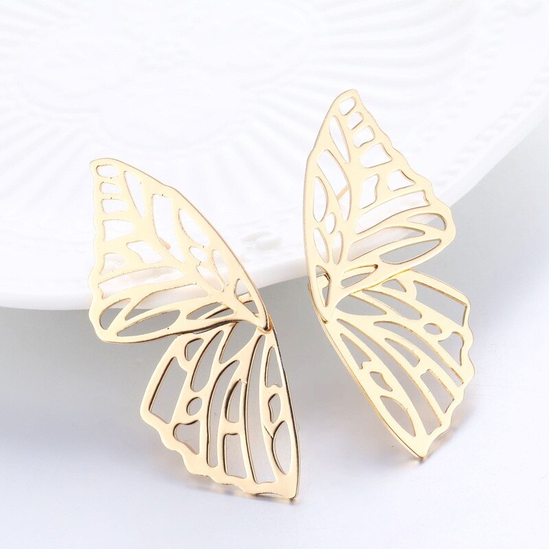 Europe and the United States cross-border jewelry alloy earrings hollowed-out butterfly grain earrings lady exaggerated