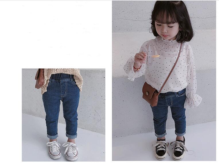 De lente meisje dragen smiley gezicht kenmerken Koreaanse jeans voor kinderen