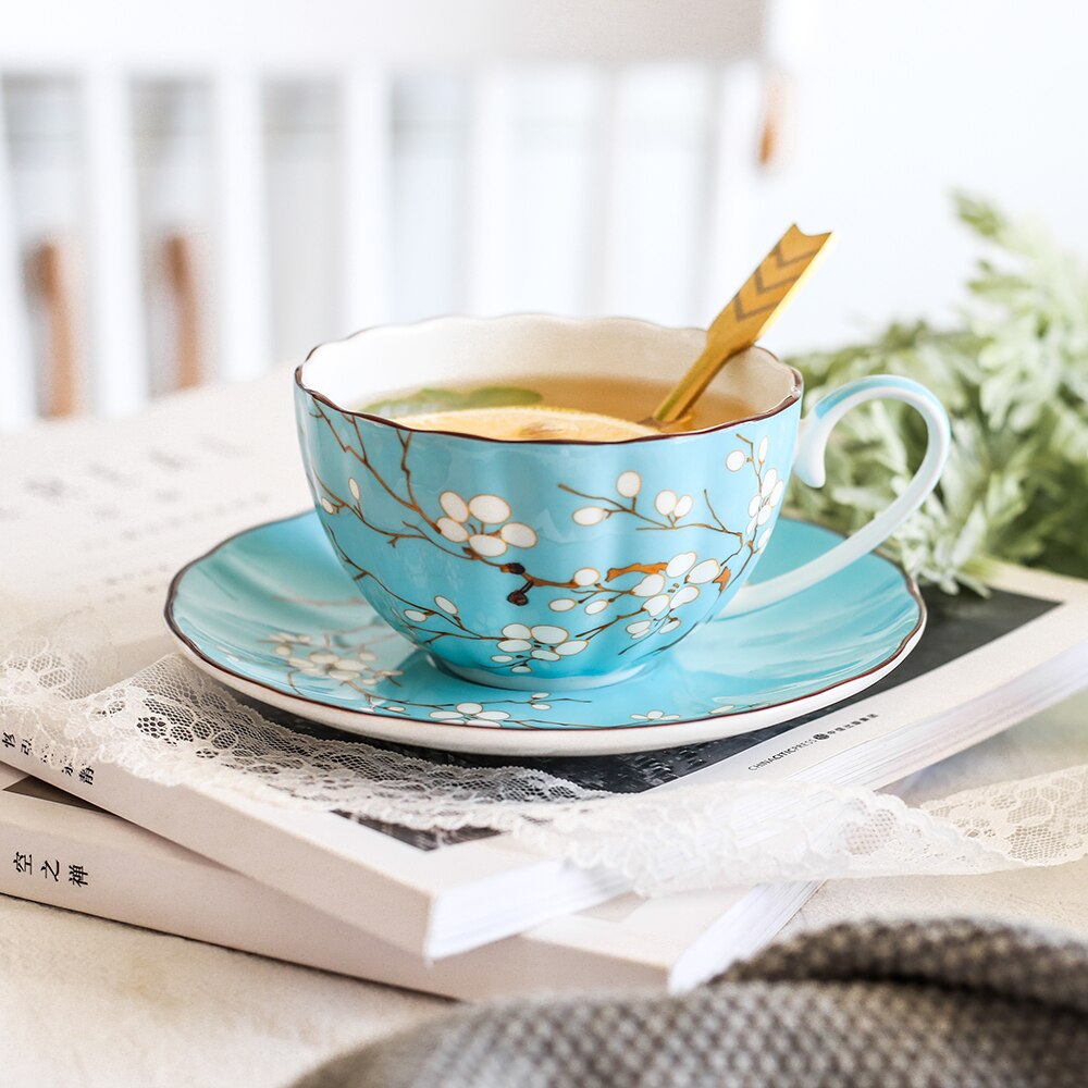 Grado Superior hueso taza de café de China conjunto británico a la hora del té por la tarde de porcelana tazas de té y platillos postre placa plana de de té