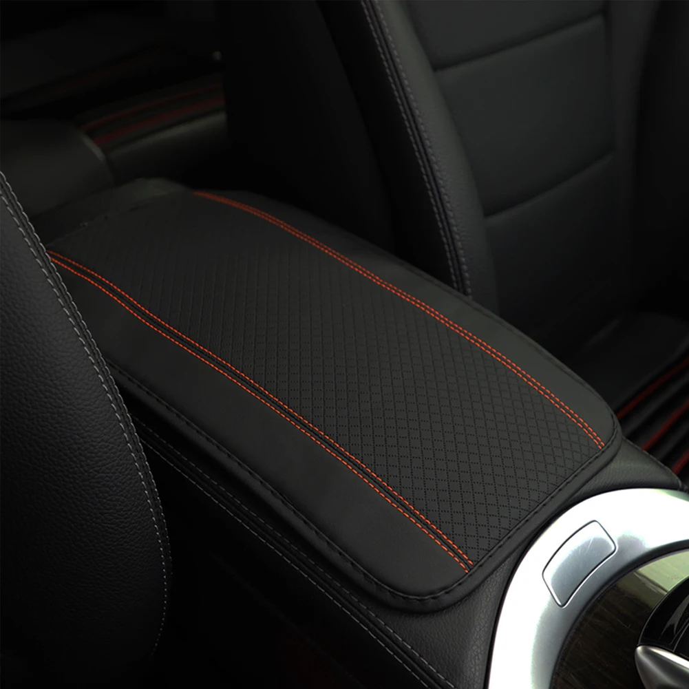 Almohadilla para reposabrazos de coche, cubierta protectora de reposabrazos Central antideslizante de doble línea en relieve de cuero y fibra, accesorios universales de estilo para automóvil: Naranja