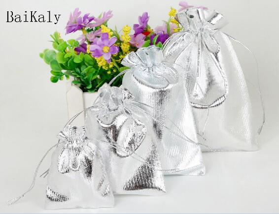 50pcs/lot 11x16 13x18 15x20 17x23cm Golden/Silver Color Drawstring Organza bag Christmas Wedding Jewelry Packaging bags: Silver / 13x18cm