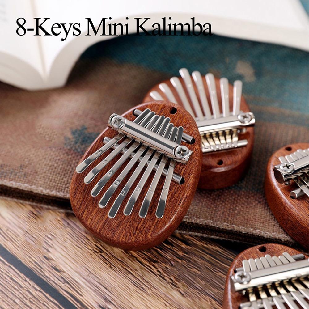 8 llaves Mini Piano de pulgar Kalimba Mbira sólido de madera de juguete de con cordón colgantes para principiantes