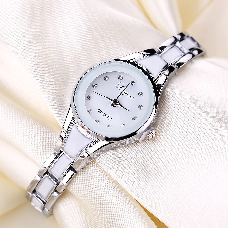 Vrouwen Horloge Vente Eenvoudige Mode Armband De Modus De Montres Mannen Man Vrouw Quartz Mannen Horloges Klok Dames meisjes