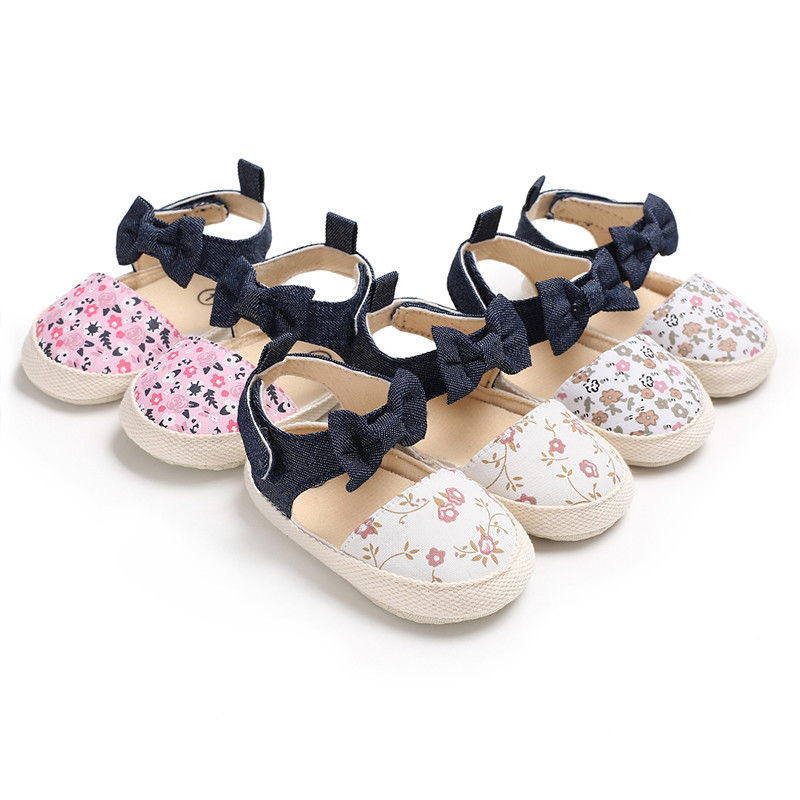 Nyeste merke nyfødt baby jente myke sko myke såler sklisikker bowknot floral baby krybbe sko 0-18m
