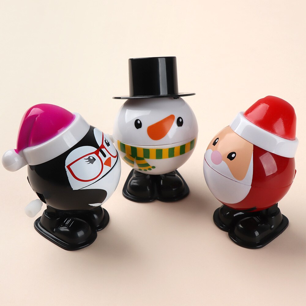 1 PC Leuke Kleurrijke Cap Plastic Mini Kerst Kerstman Classic Wind Up Speelgoed Sneeuwpop Pinguïn Clockwork Speelgoed