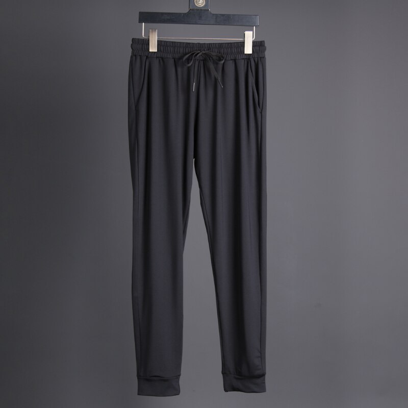 Pantalons longs en cours d'exécution hommes Polyester mince Sport entraînement Joggers poches solides pantalons de survêtement Compression hommes pantalons décontractés: black / XS