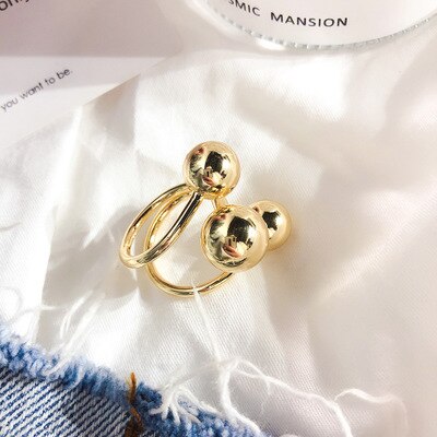 HUANZHI Exaggeration Gold Color Metal Ball Open Rings Simple Geometric Irregular Finger Rings for Women Party Jewelry: A