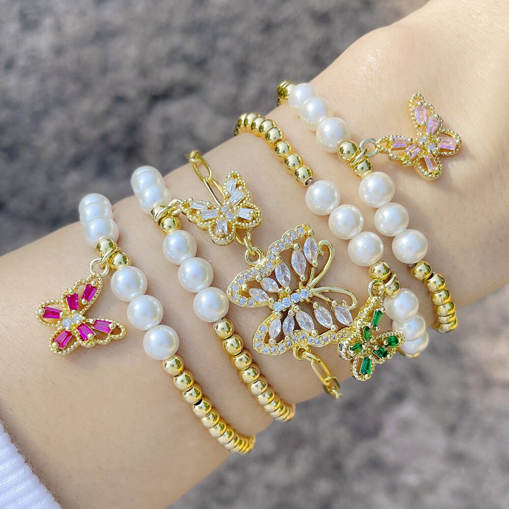 Flola Koper Zirkoon Vlinder Armbanden Voor Vrouwen Gouden Kralen Ketting Elastische Touw Parel Armband Crystal Sieraden Brtf64