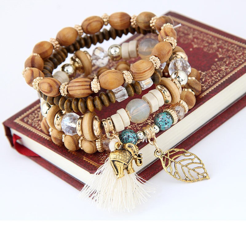 Europese en amerikaanse retro sieraden etnische log kralen kwast baby olifant blad stretch armband set vrouwelijke armband voor vrouwen: Imitatie rhodium plated