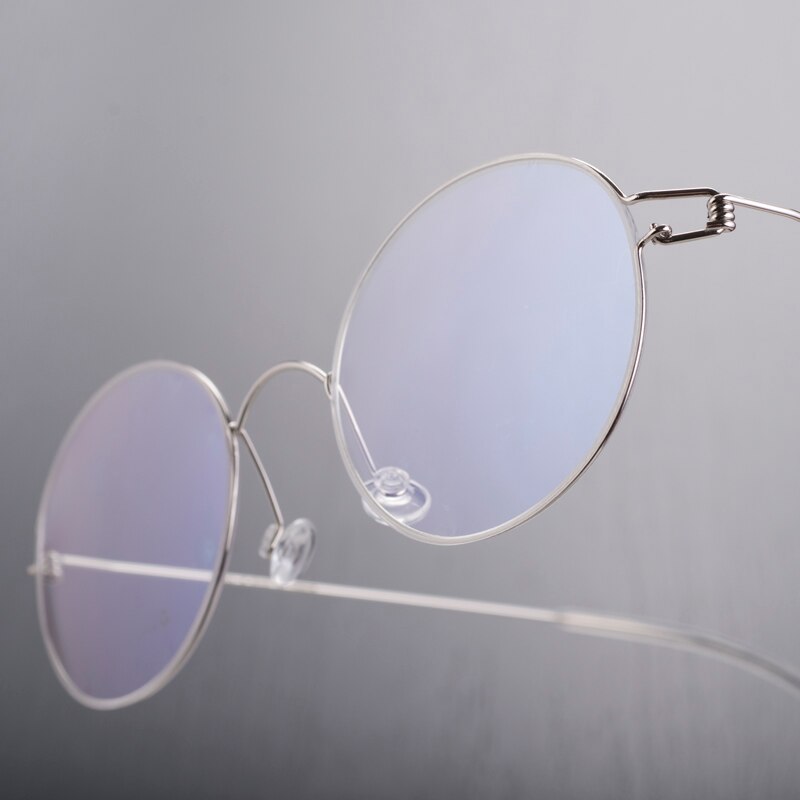 Ren titanium uden skrue letvægtsbriller mænd kvinder optiske briller retro rund brillestel med silikone næsepuder