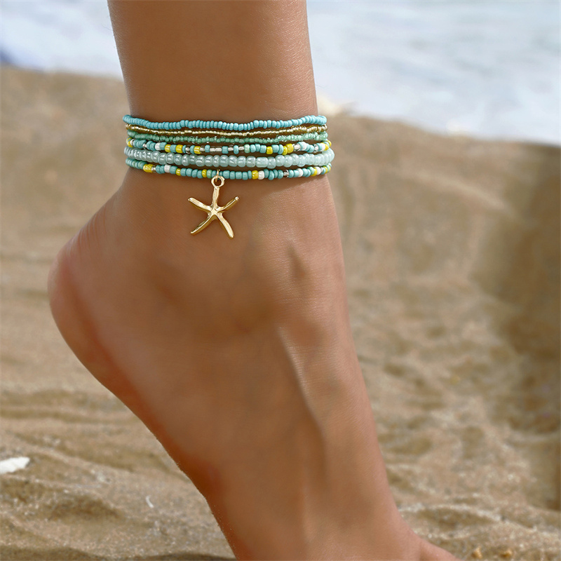 Tobillera bohemia multicapa con cuentas de arroz para mujer, tobilleras con colgante de estrella de mar a la , cadena de tobillo de playa de arena para verano, joyería en la pierna: Color marrón amarillo