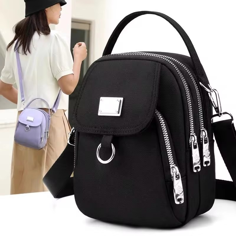 1pc dame casual messenger taske, ensfarvet multifunktionel pung, flerlags letvægts oxford håndtaske, velegnet til at gå ud: Sort