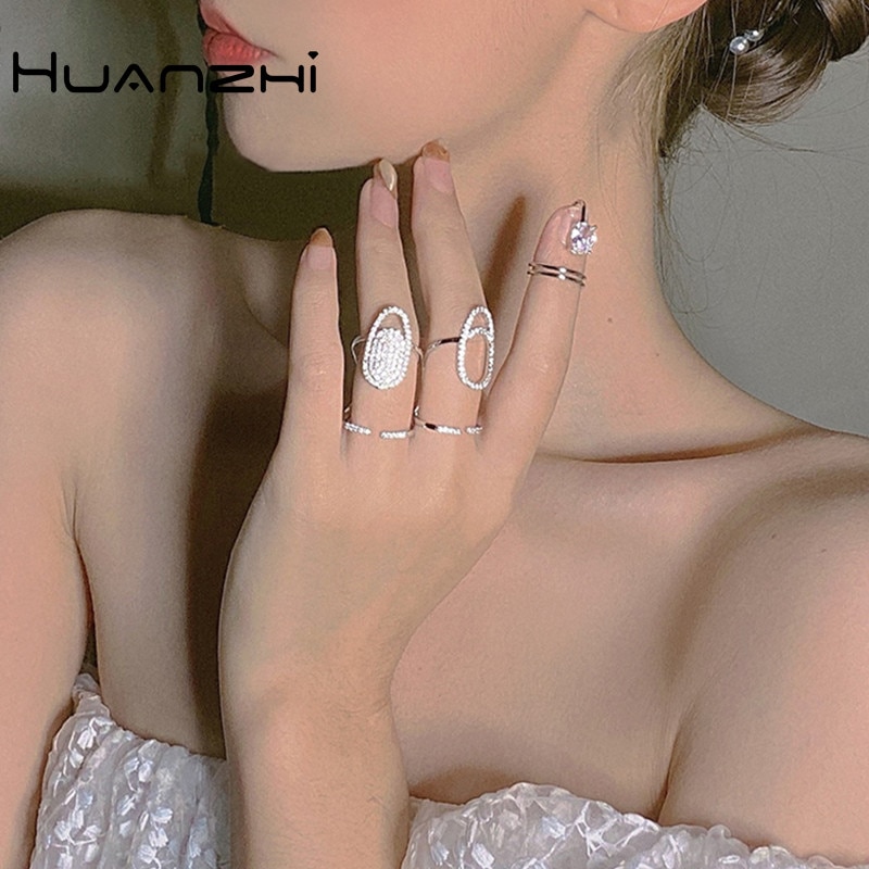 HUANZHI Neue Koreanische modisch Coole glänzend Strass Intarsien Fingerspitze Nagel Legierung ringe für Frauen Mädchen Party Zubehör