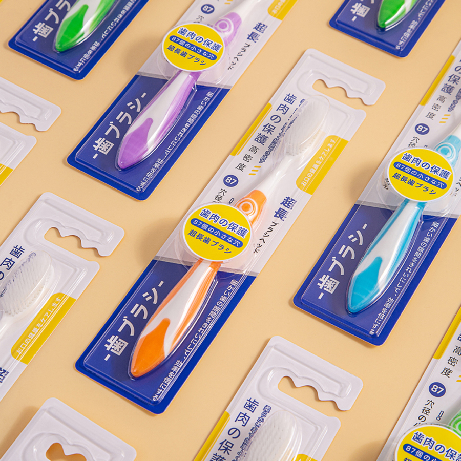 Cepillo de dientes de cerdas suaves de cabeza grande de alta densidad de 4 colores con mango cómodo y antideslizante, adecuado para uso familiar y adultos