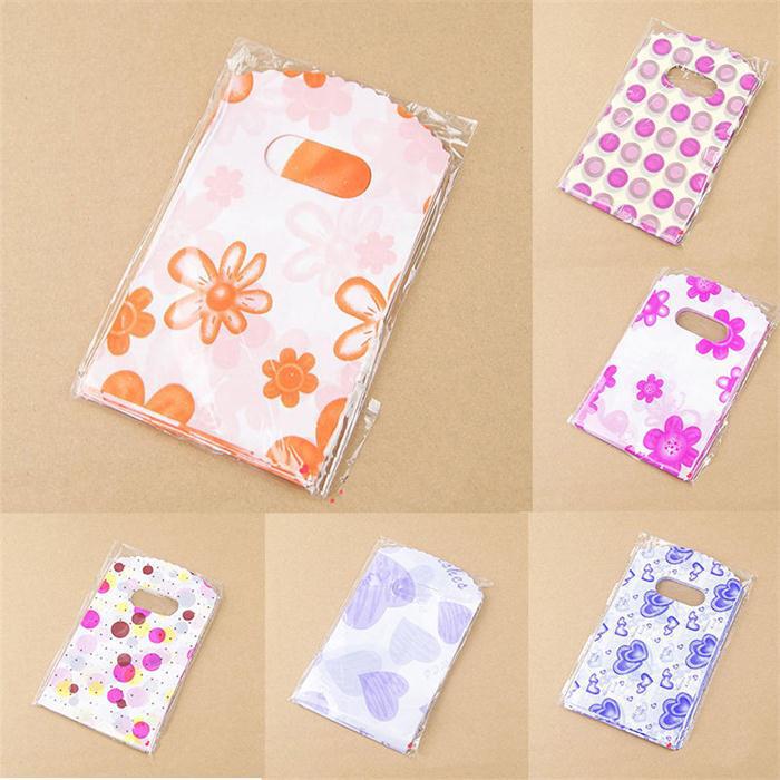 100pcs/Lot 14X9CM Home Storage Plastic Packaging Bags With Handle Small Bags