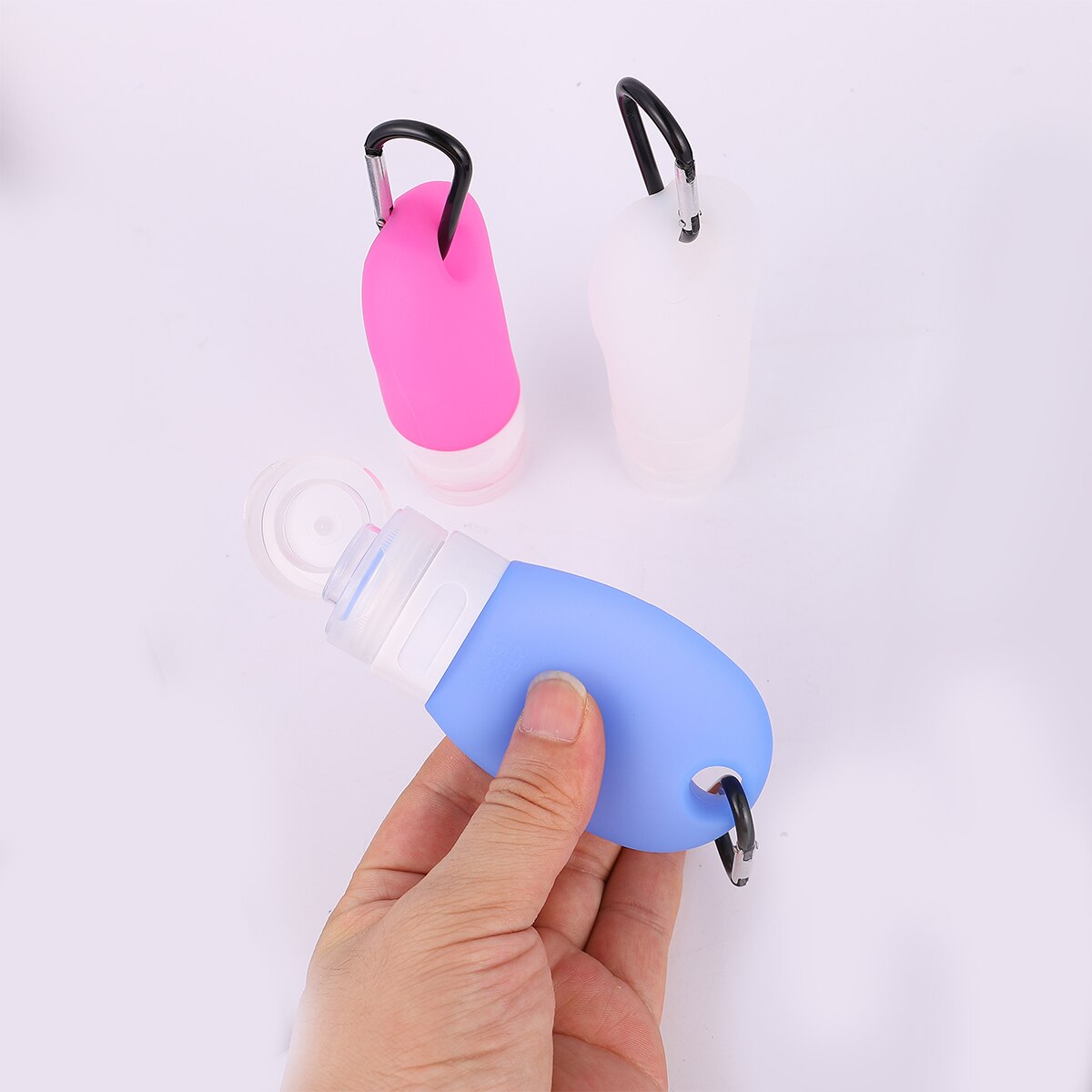 7pcs Silicone Travel Bottles Refillable Squeezable Bottles PVC Travel Bag Keychains (3PCS Bottles 1PC Bag 3PCS Keychains)