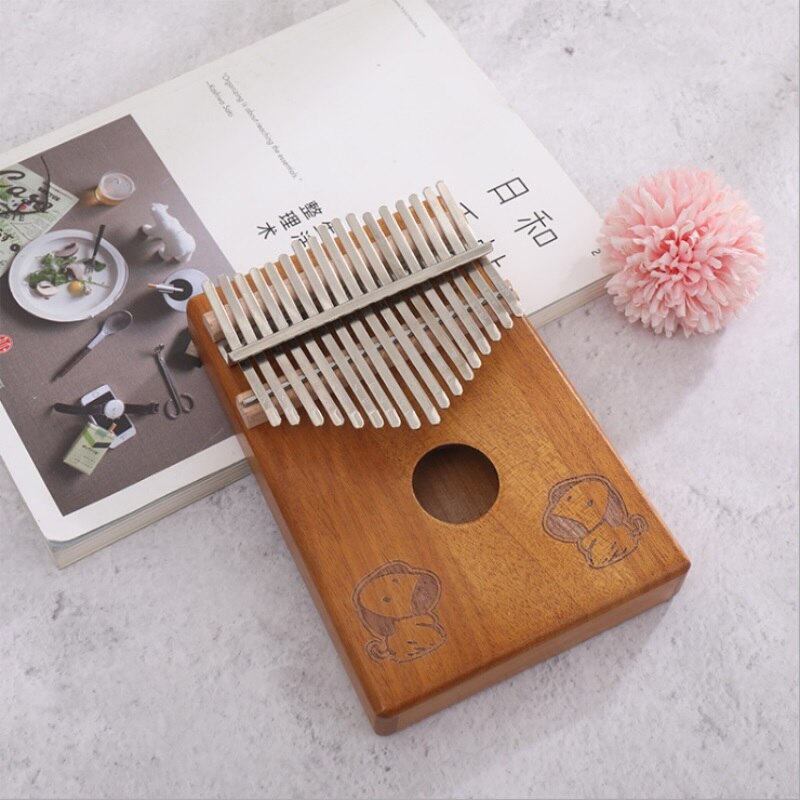 17- taster kalimba thumb piano kinesisk stjernetegn mønster bærbart thumb piano gir god lyd og studiebok for nybegynnere: Hund