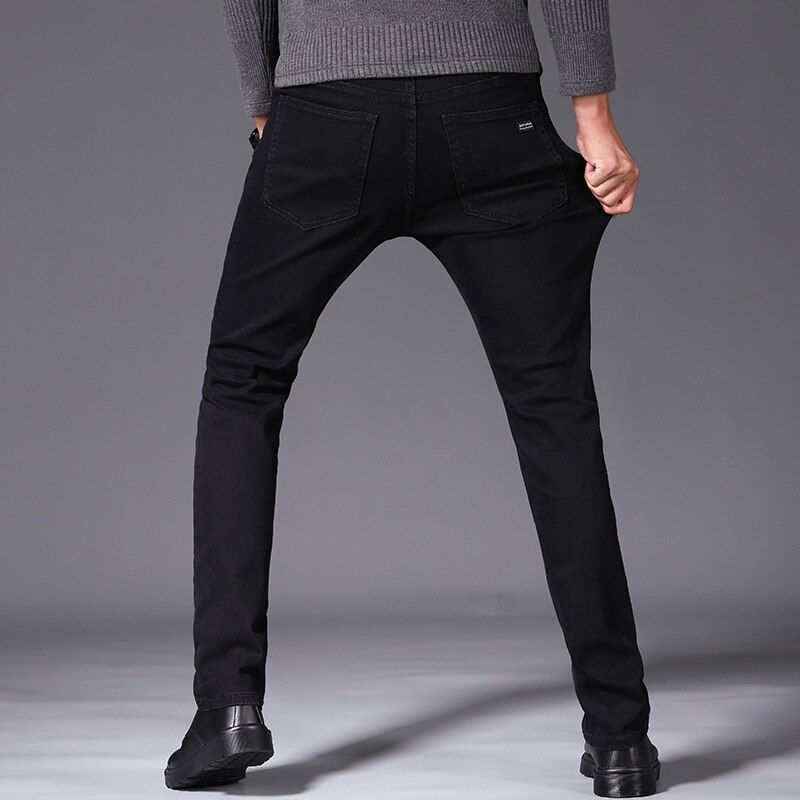 Black plus velvet men's business casual jeans Classic loose soft cotton trousers winter Warm pants