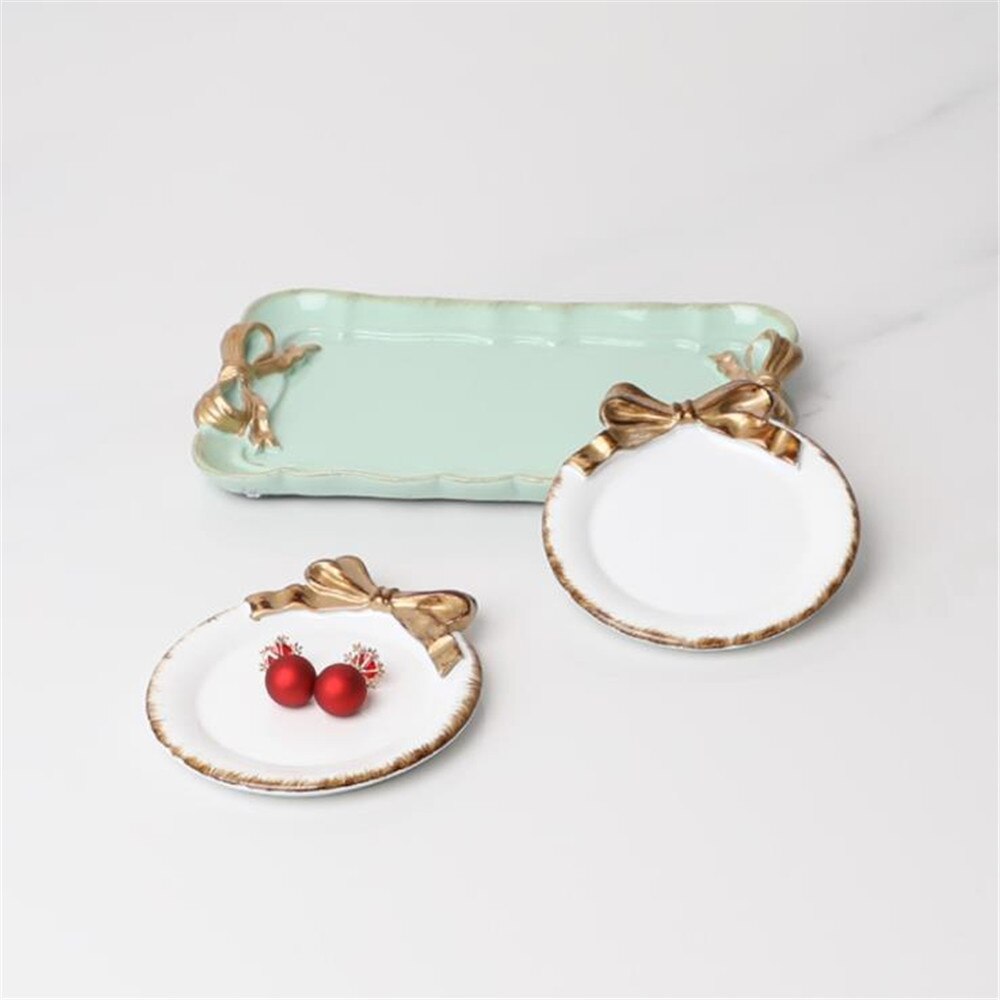 Kreative Harz Platte SchöNe retro Gold Überzogene Bogen-knoten aufbringen Nachtisch Obst Kuchen Platten Lagerung Tabletts Hause Dekoration 1Stck