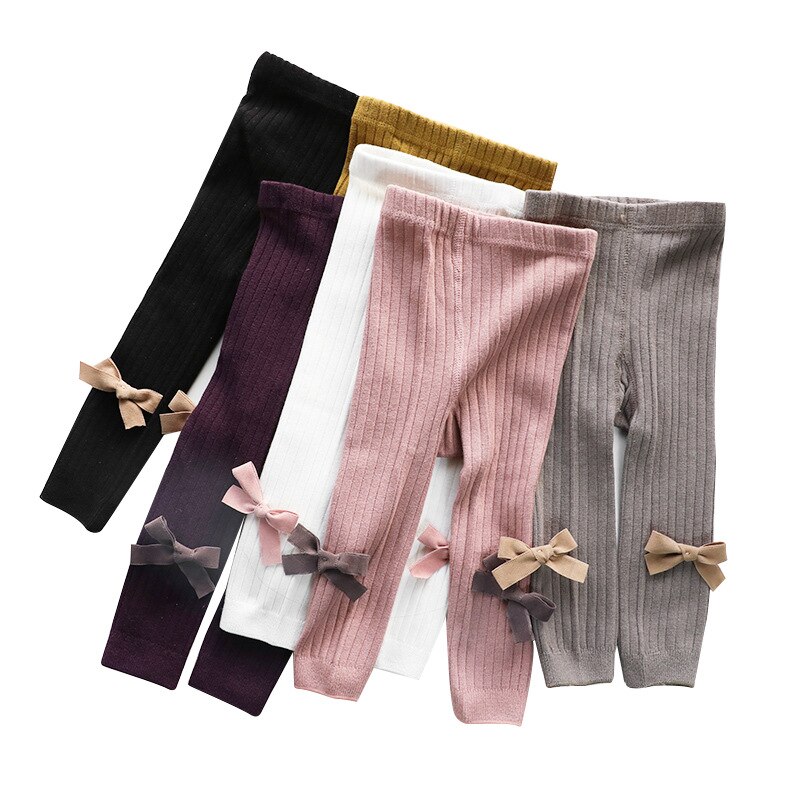 Śliczne kokardki miękka bawełniana dziewczynka rajstopy jednokolorowe dzianina w paski dziewczyny obcisłe rajstopy zimowe spodnie na jesień ubrania pończochy