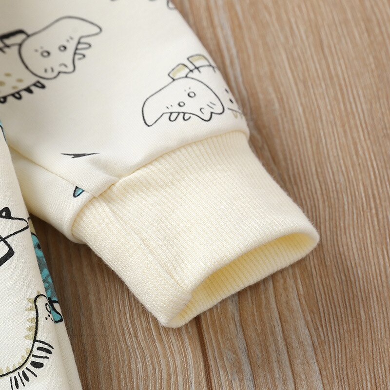 Carter niño pequeño primavera y otoño bebé niño y niña dibujos animados dinosaurio mono de manga larga