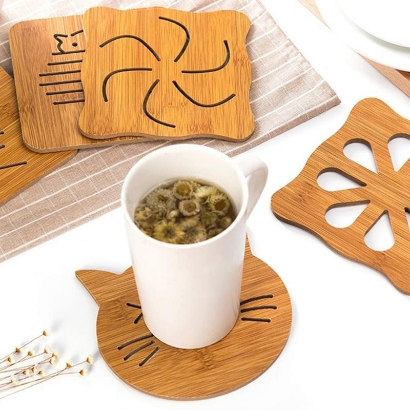 1pc coaster pinwheel stort fiskben tålig katt härligt tecknat köksbord som skyddar träkopp