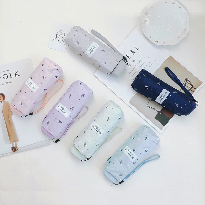 Paraguas plegable superligero y pequeño para mujer, Mini sombrilla de viaje de 220g con bolsillo para lluvia