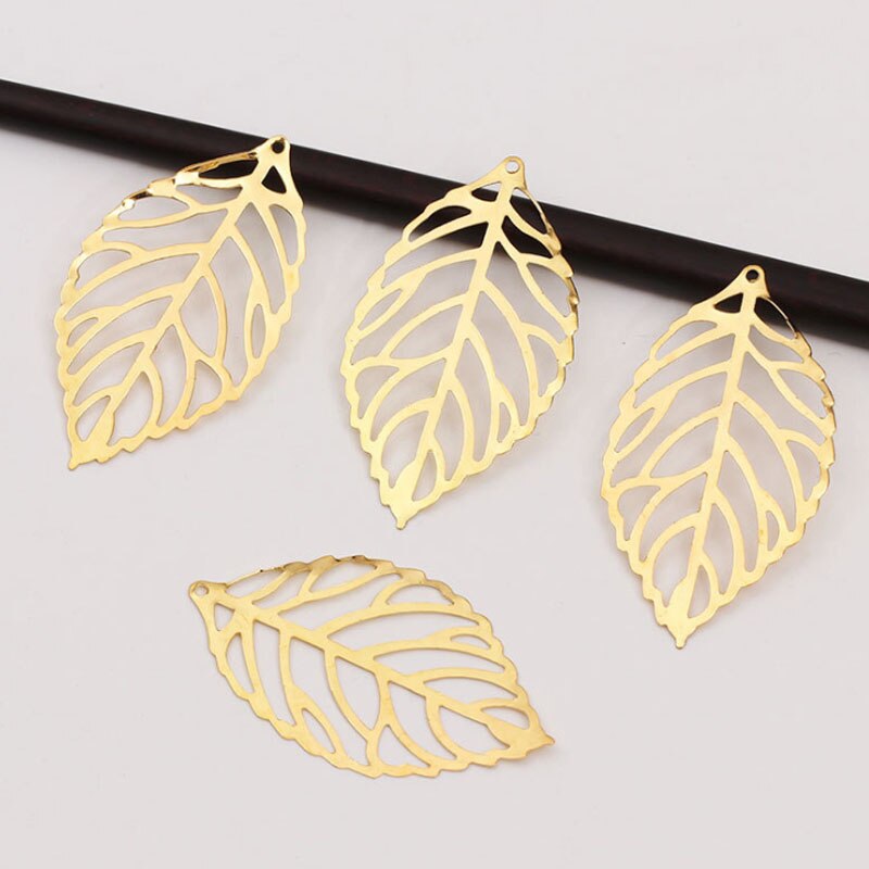 50 st hantverk vintage pläterad retro guld charm filigran ihåliga blad hänge smycken tillbehör smycken gör diy