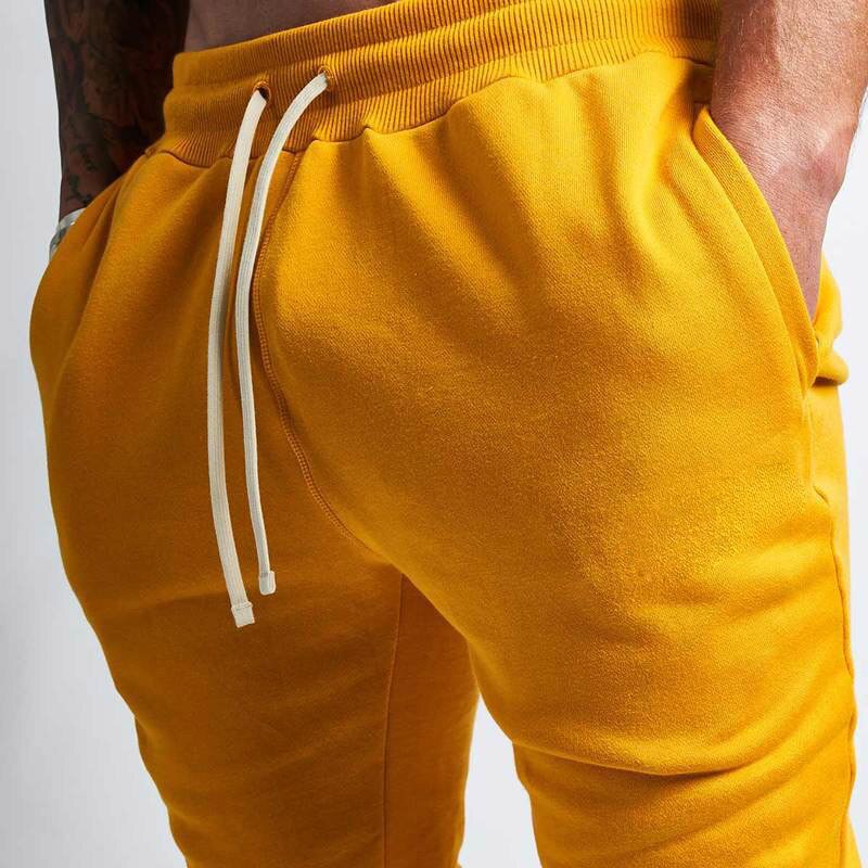 Sportbroek heren joggingbroeken joggingbroeken gele zomer effen broek zwarte joggingbroek fitness heren sportkleding broeken sport