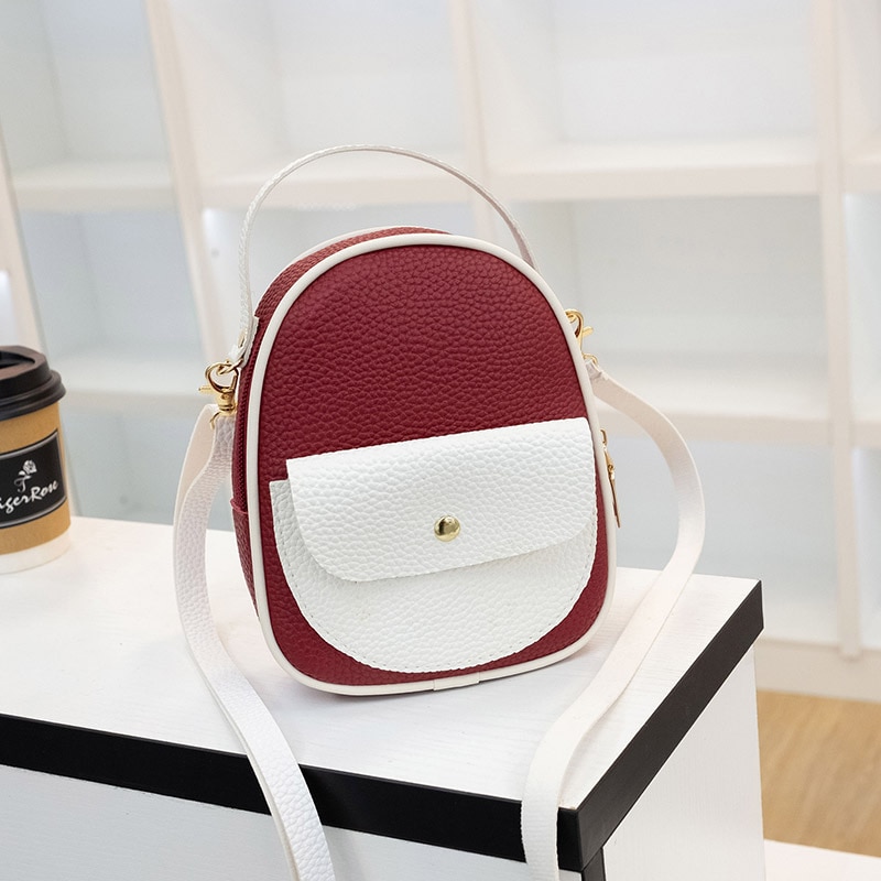 Dames contrasterende kleur reliëf leren rugzak crossbody/schoudertas mobiele telefoonhoesje kleine rugzak: Rood