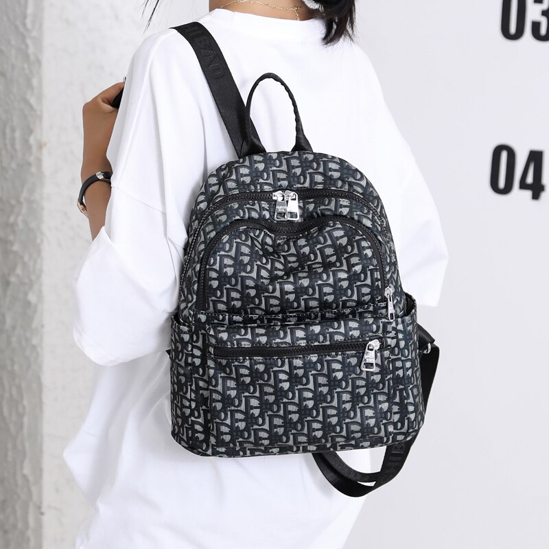 Vento-mochila de viaje para mujer, bolso de hombro de nailon resistente al agua, escolar, suave, con letras,
