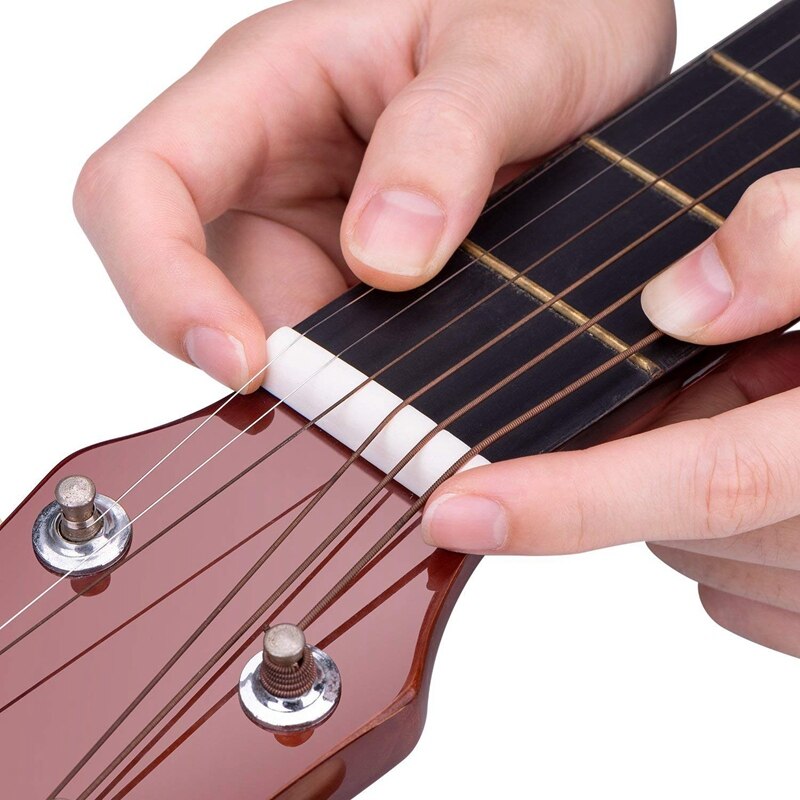 1 Pcs Wooden Giraffe Pattern Dual Series 32 Hole Harmonica & 3 Set (6Pcs) Guitar Nut and Acoustic Bridge Saddle