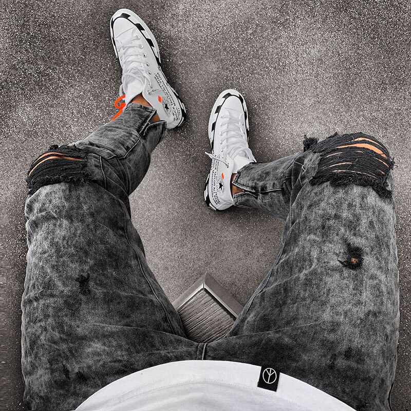Sofie heren jeans met gaten, elastische europese heren hiphop gescheurde slanke jeans, broek met geborduurde kleine voetjes