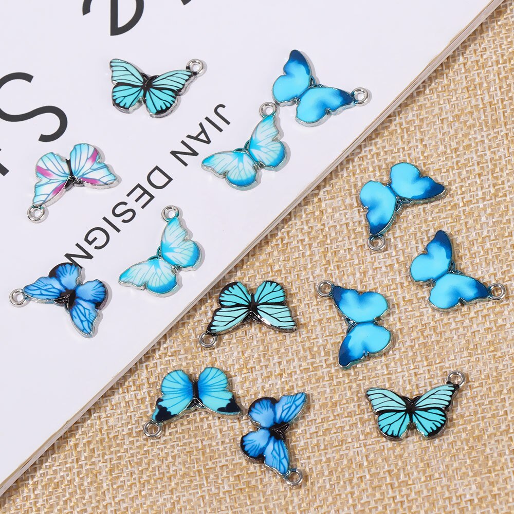 Colgantes de mariposa de esmalte azul, accesorios de joyería hechos a mano, 10 piezas