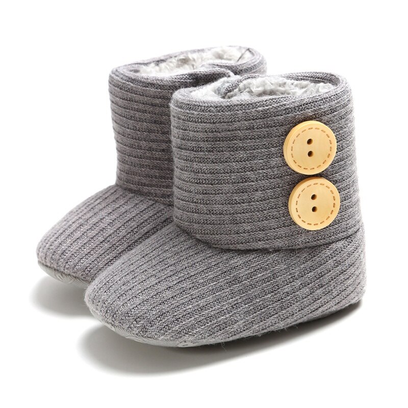 Baby warme winterlaarzen meisjes zachte zool wieg schoenen knoop katoenen platte laarzen gebreide effen knopen peuterschoen
